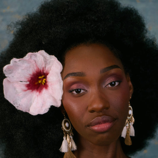 White and Pink handmade felted hibiscus flower hair clip inspired by Sorrel Flower, Caribbean and West African cultural heritage